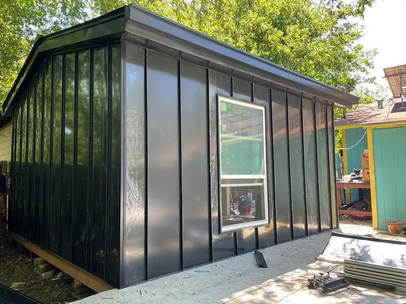 Black standing seam metal wall panels for Metal Roof Installation in University of California-Santa Barbara